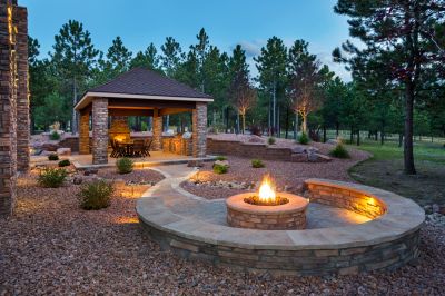Create a Cozy Outdoor Atmosphere with a Fire Pit Installation!